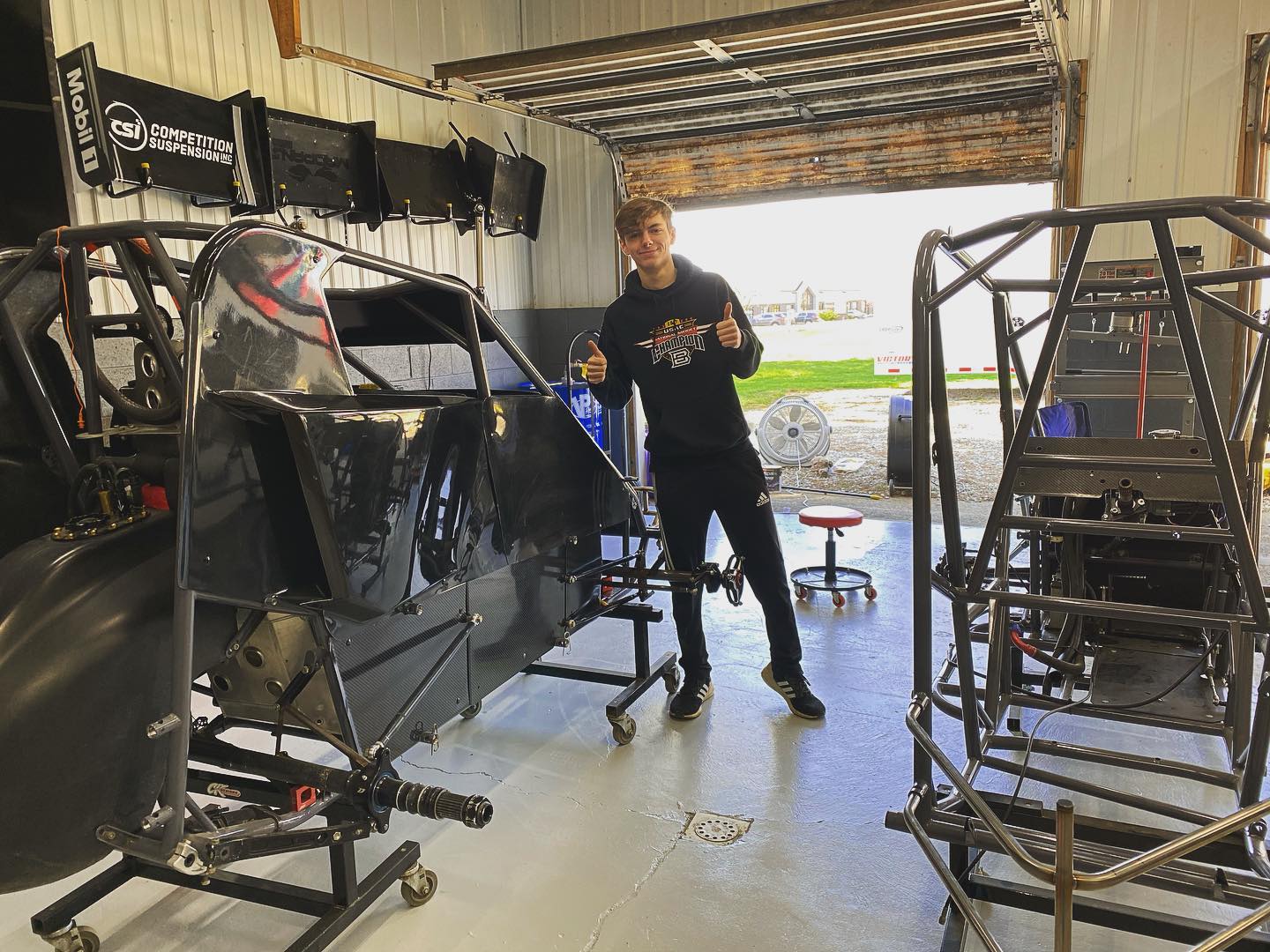 One car ready to drop, second car ready to assemble, 3rd car at powder coat.