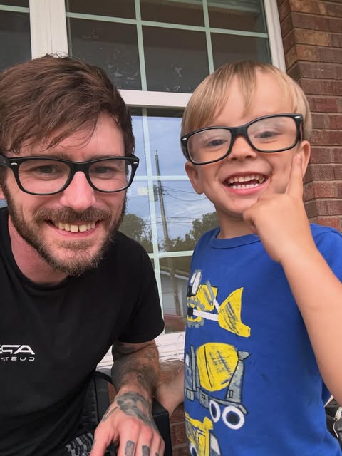 TeeJay and Atom smiling together